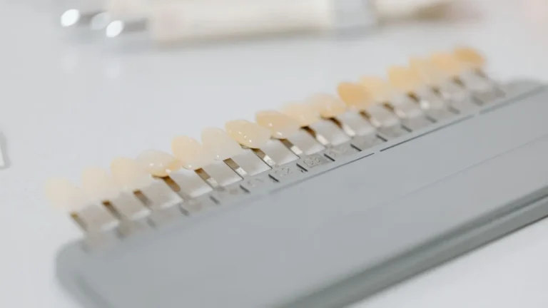 Close-up image of a dental shade guide displaying various tooth color options.