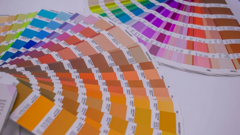 A collection of Pantone color swatches showcasing a wide range of vivid hues for designers.