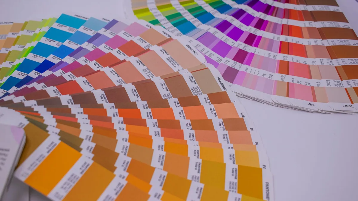 A collection of Pantone color swatches showcasing a wide range of vivid hues for designers.