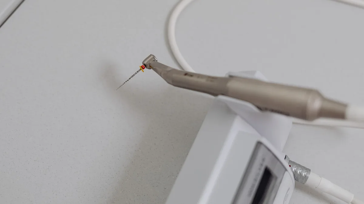 Detailed view of a dental instrument used in dentistry, showcasing precise technology.